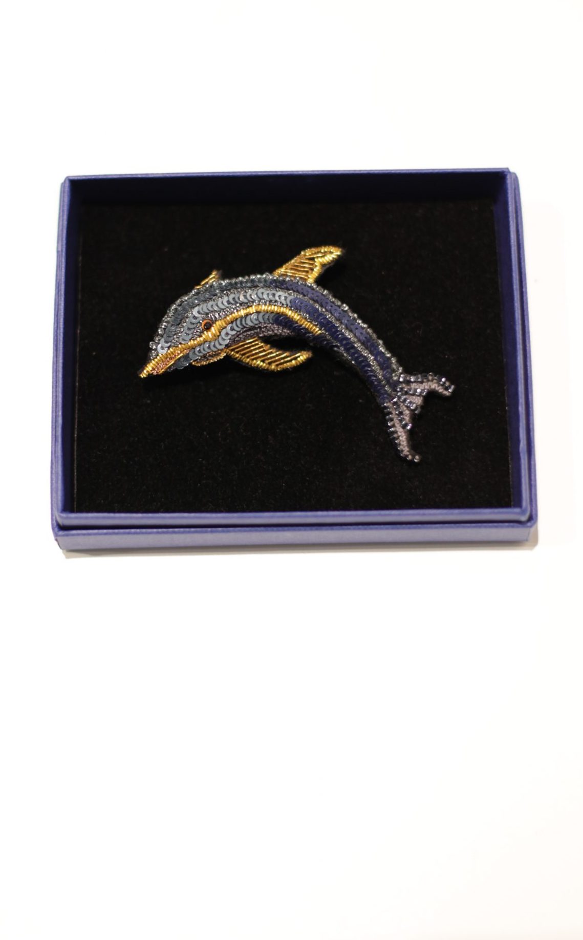 Dolphin brooch deals